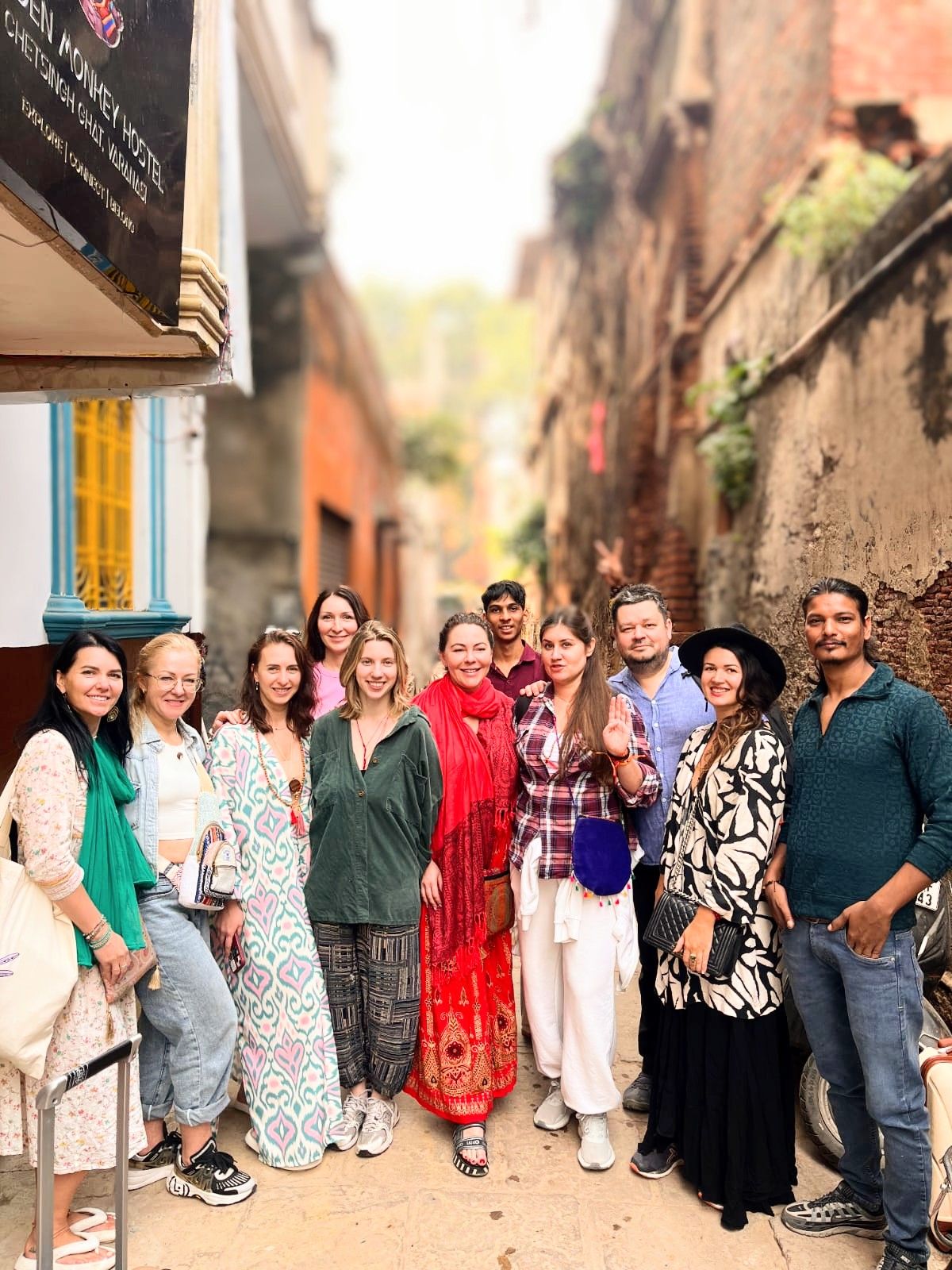 Group walking in the Varanasi alleys