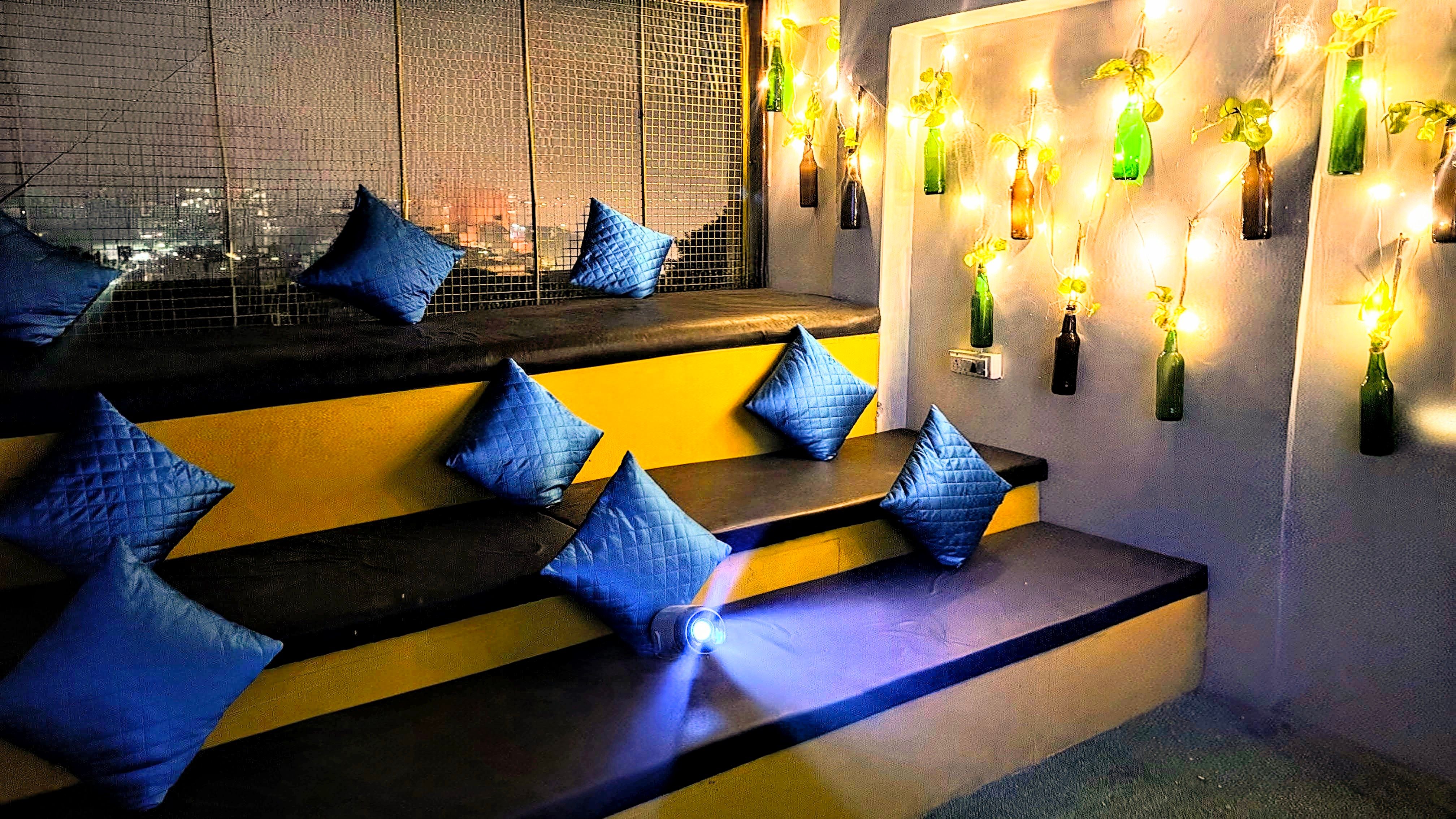 Travelers' Storytelling & Rooftop Movie Night